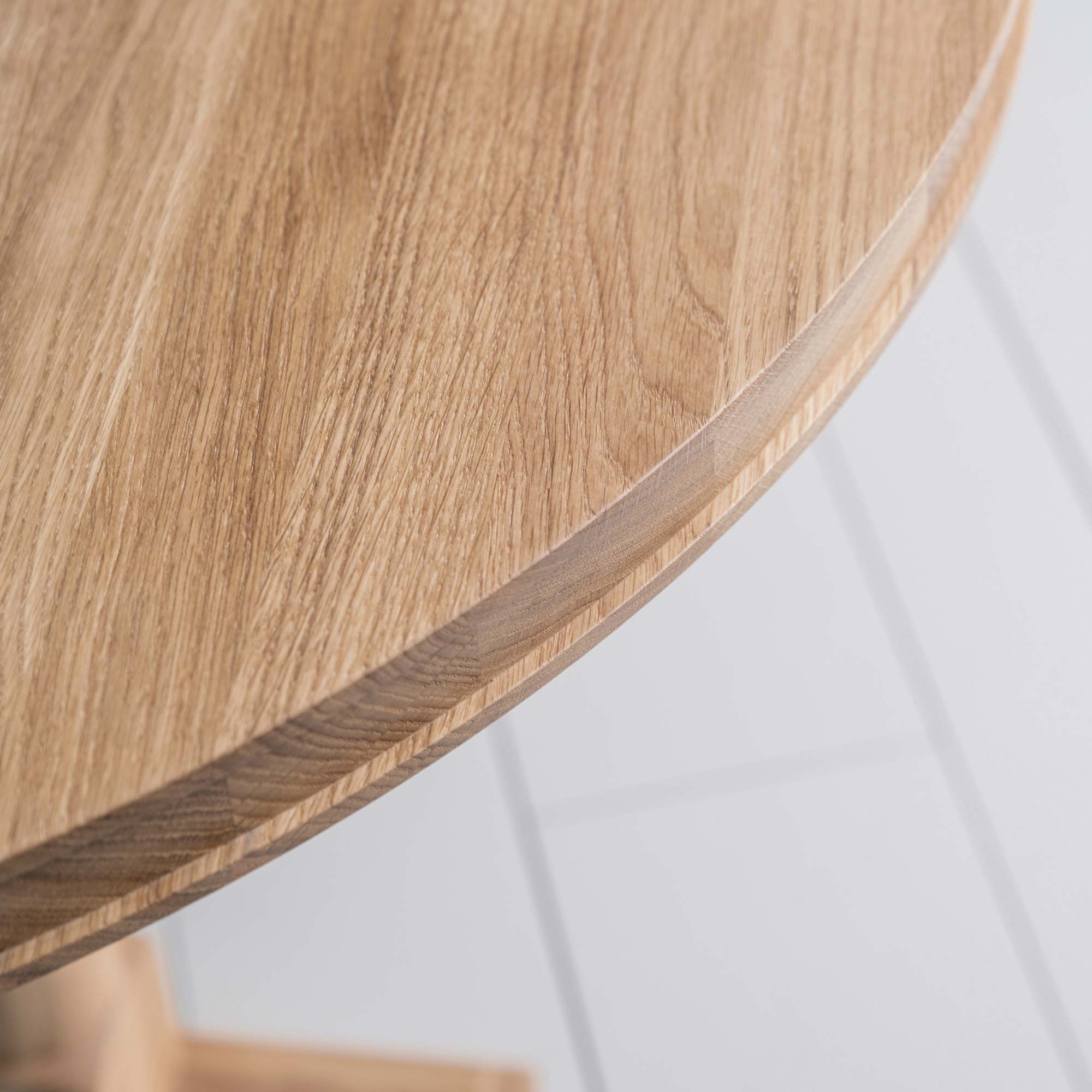  Edge Design Closeup of Tuck In Oval Dining Table in Oak - NiX 