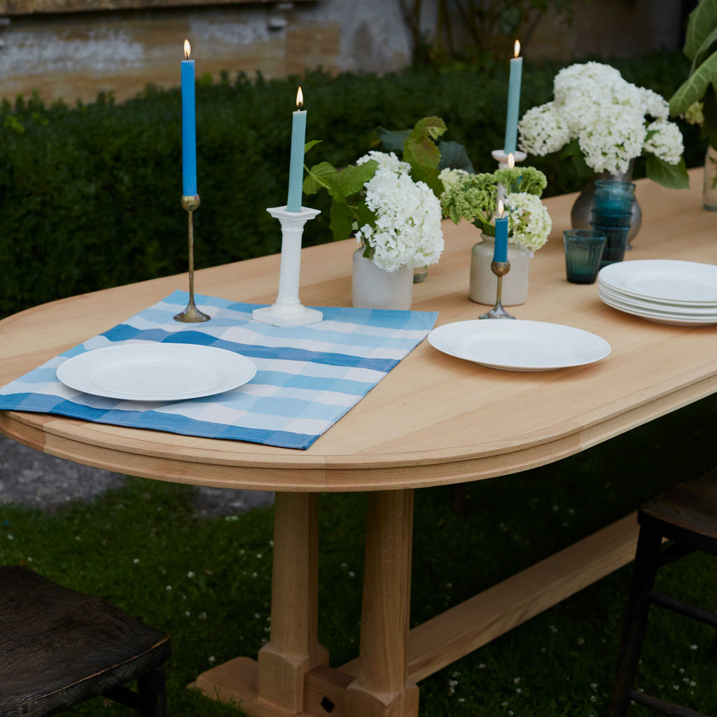  Out Door Tuck In Oval Dining Table in Oak, With Candles, Plates and Flowers - Nicola Harding & Co. 