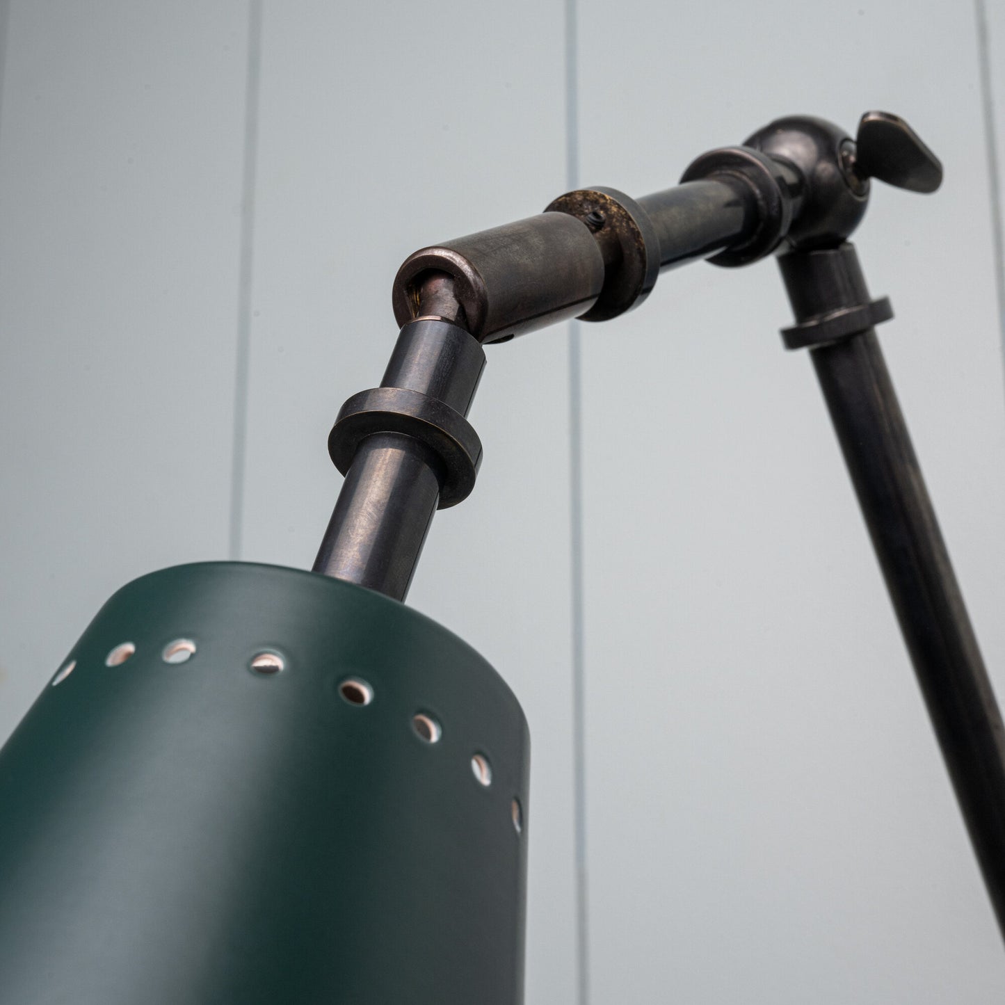 Limelight Waxed Brass Wall Light with moveable arm