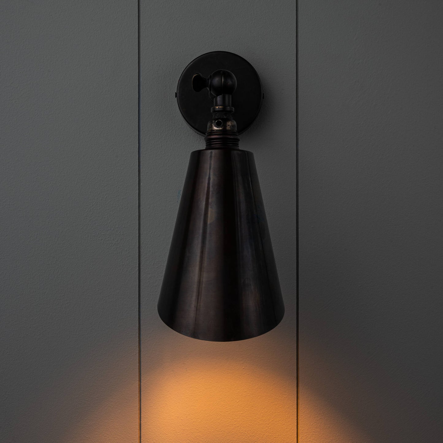 Lights 'ON' Waxed Brass Wall Light Front View