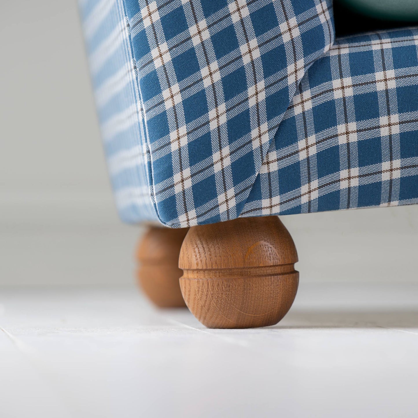 Perch Slipper Armchair in Well Plaid Frame and Intelligent Velvet Mineral Seat With Round Wooden Foot Closeup - NiX