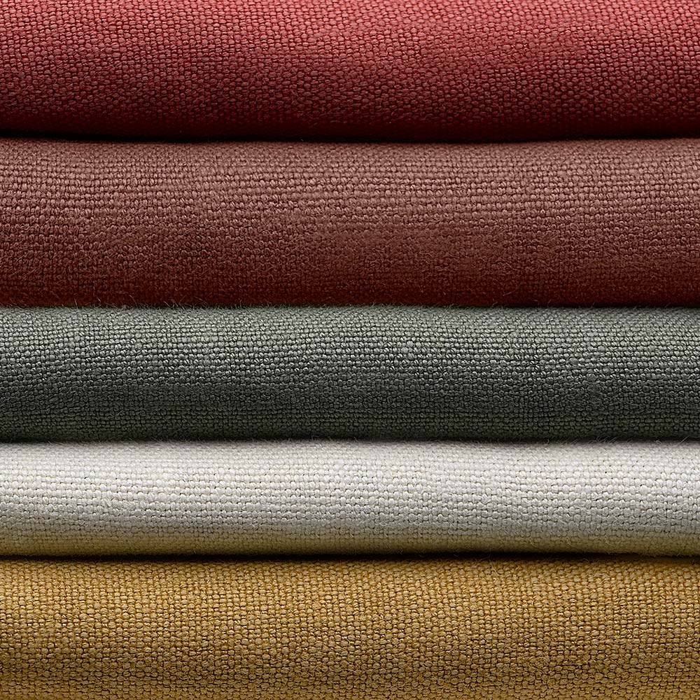 Stack of Linen Fabrics in Multiple Colors Layered Together – By NiX